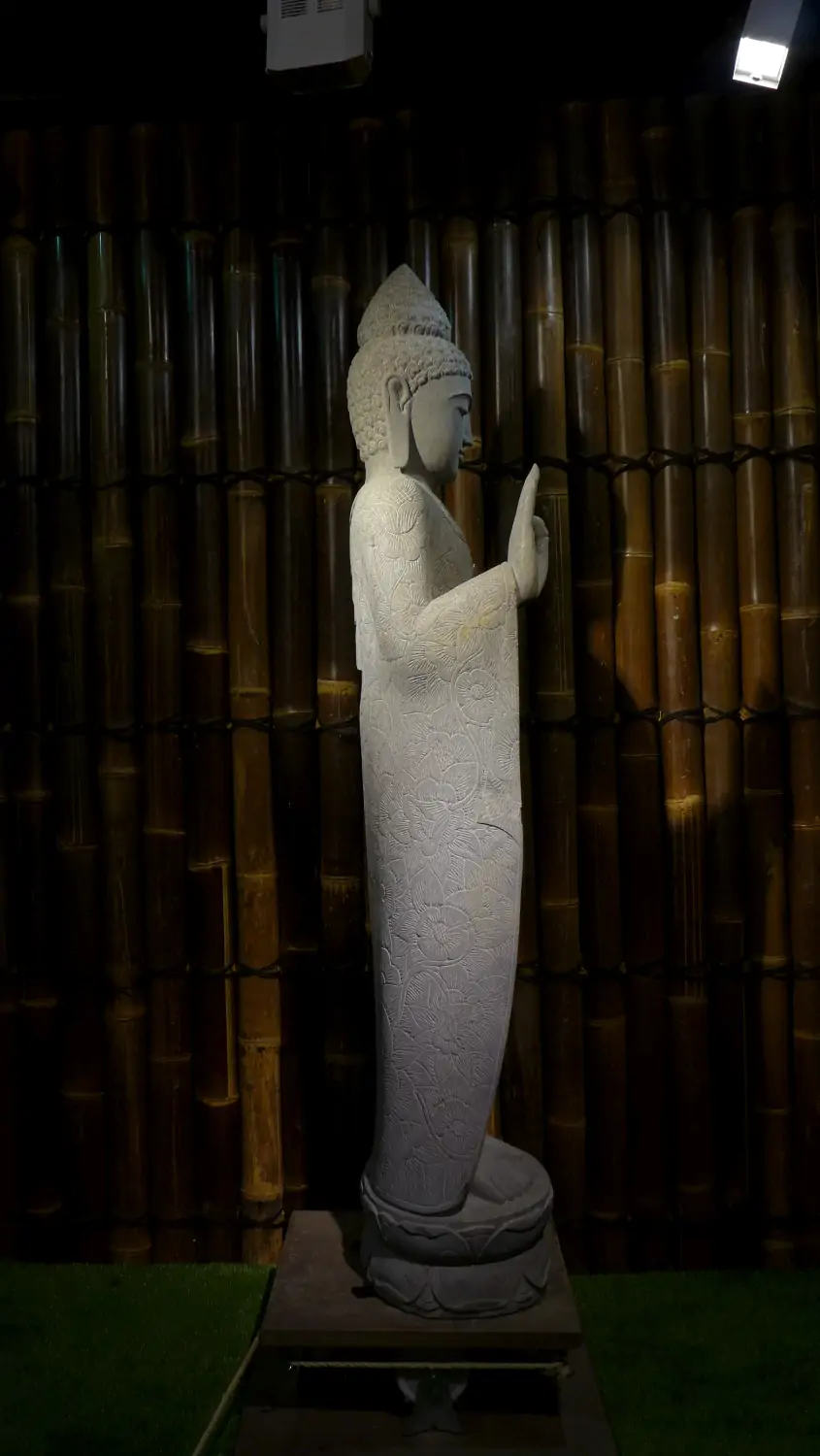  Product image 9 of the product “Standing Buddha with floral carving, Abudaya position. 43 x 39 x 175cm. Natural stone (river stone), stonemasonry ”